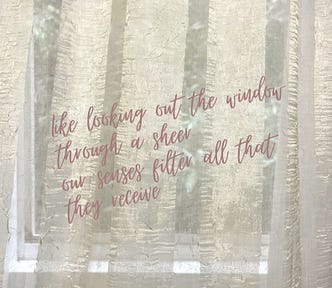 Sheer curtains on a window with the superimposed words, ‘like looking out the window through a sheer our senses filter all that they receive’.
