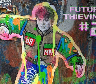 Photo of graffiti of Michael J Fox in Back To The Future — by Naomi Tamar at Unsplash