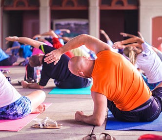 people in a yoga class, 3 Critical Reasons for Exercise Provides Amazing Benefits for Hypothyroidism, thyroid, yoga, exercise