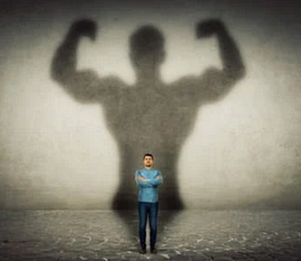 strongman shadow and male image
