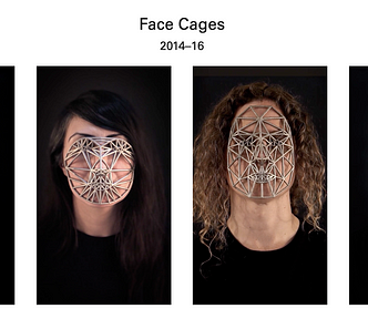 Four people wearing weird masks with different shapes