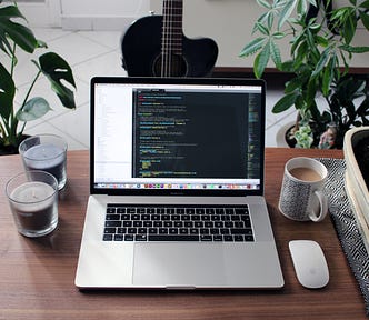 Laptop with code on a table