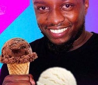 KSI vs Swarmz — Ksi’s opponent holding two cones of ice cream and smiling. The smile on his face portray’s the excitement of a young boy.