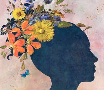 A silhouette of a woman with flowers blooming from her head.