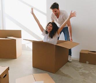 Happy woman in a box