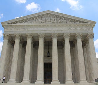 Photo of the US Supreme Court building by Claire Anderson on Unsplash