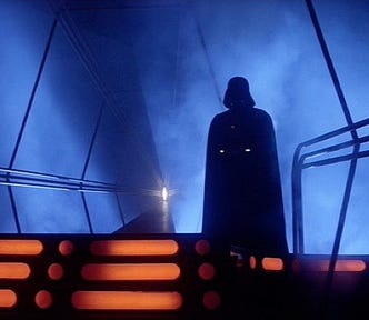 Darth Vader standing ominously in The Empire Strikes Back.