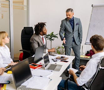 Manager Setting Goals in a Meeting