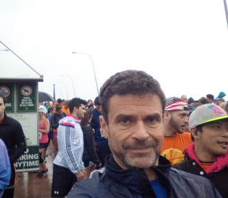 Writer about to run a half marathon in a driving rain, October 2014