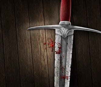 sword on a table with blood