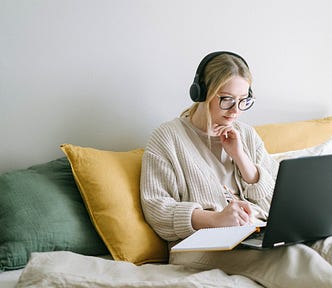 Person on laptop in bed