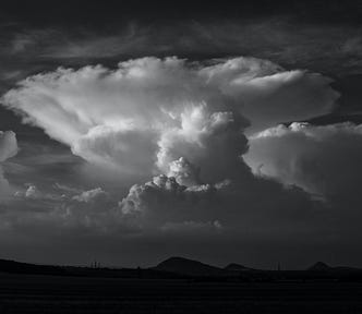 Black and white photo of an angry looking cloads