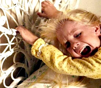 Screenshot of the late Heather O’Rourke as the terrified Carrie Ann in ‘Poltergeist.’