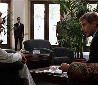 Harrison Ford and Willem Dafoe in a hotel lobby — image from Clear and Present Danger.