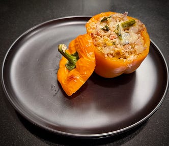 A stuffed orange bell pepper. Image courtesy of the author. 