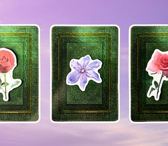Three tarot pick a card piles from the Good Tarot deck: pile 1 — red rose, pile 2 — purple flower, and pile 3 — pink rose