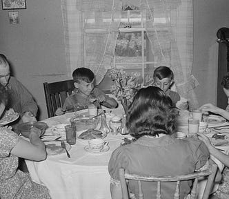 Rothstein, A., photographer. (1939) Farm family at dinner. Fairfield Bench Farms, Montana. Montana Fairfield Bench Farms United States Teton County, 1939. May. [Photograph] Retrieved from the Library of Congress, https://www.loc.gov/item/2017777606/.