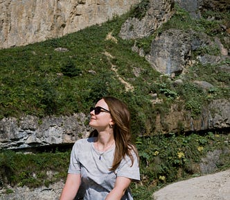 woman sitting in nature