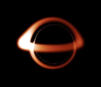 Simulated image of a non-rotating black hole — A model for Sagittarius A (Image from WikiCC) — The black hole appears to look like an eclipsed star with a toroidal ring surrounding it. The leftward edge of the ring appears to be brighter. Likewise, the top surface of the ring appears to be brighter than the rest of the ring.