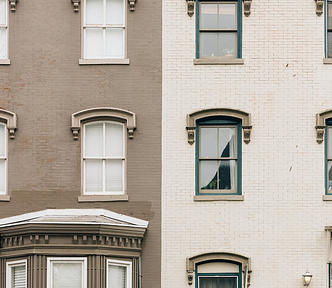 A fancy Victorian row house with bay window
