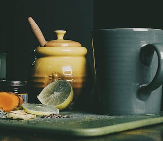 Public domain image from Rawpixel: Still life of lemon slices and ceramic crockery.