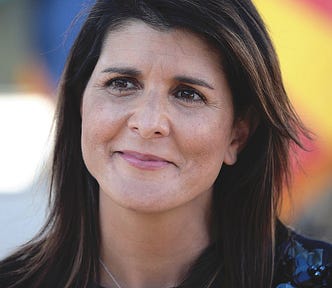 Headshot of Nikki Haley with multi-color background.