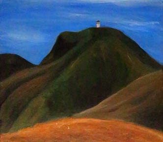 A watchtower stands high on a peak.