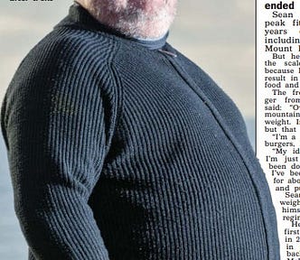 Fat person stood side on.