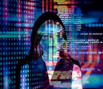 woman standing in front of projection of code on a screen