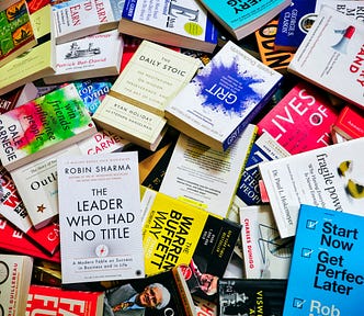 non-fiction books laying on the floor