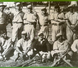 image of male baseball players. Photo appears to have been from the early 1900s.