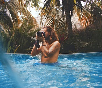 6 Common Mistakes to Avoid as a First-Time Digital Nomad — man taking picture in pool