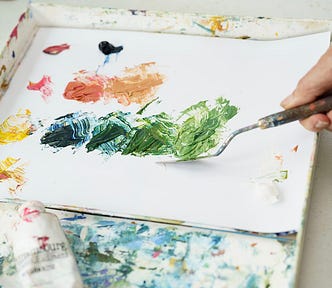 Photo of artist mixing paint ©2025 Bailey Ashlynn Photography