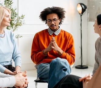 Group Attending a Meeting in a Bright Room