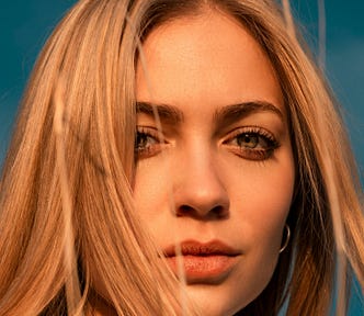 A smart-looking blonde woman