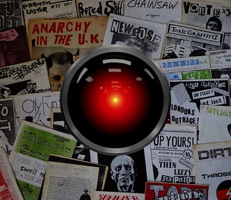 A collection of punk zines with the glaring eye of HAL 9000 from Kubrick’s ‘2001: A Space Odyssey’ in the center of the image. Image: Cryteria (modified) https://commons.wikimedia.org/wiki/File:HAL9000.svg CC BY 3.0 https://creativecommons.org/licenses/by/3.0/deed.en — Jake (modified) https://commons.wikimedia.org/wiki/File:1970s_fanzines_(21224199545).jpg CC BY 2.0 https://creativecommons.org/licenses/by/2.0/deed.en