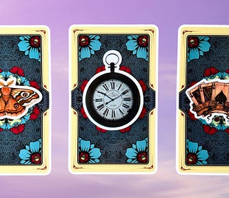 Three tarot pick a card piles: pile 1 — moth, pile 2 — watch, and pile 3 — cards