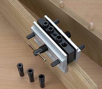 Dowel jig with 3 spare inserts