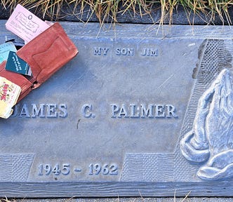 gravestone which reads my son Jim — with wallet, contents,