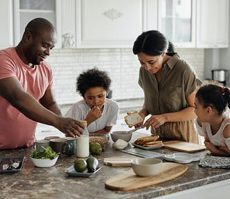 family preparing a meal together