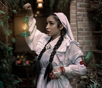 A nurse in a white uniform holds a lamp in the dark.