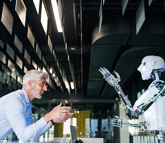 A strategy consultant discussing with a robot advisor