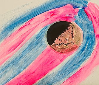 A cutout of the moon is surrounded by waves of pink and blue that make it look like it’s moving through the sky. There is white in the background, so all of the colors of the trans flag are present.