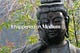 statue in the forest of Nikko, with text overlay: it happened on medium april 2025