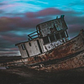 A rusty, abandoned ship, listing to one side. Representative of the author’s state of mind at the beginning of the story.