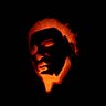 A pumpkin carved with the face of Michael Myers.