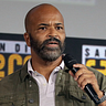 Photo of Actor Jeffrey Wright with a concerned look on his face and speaking into a microphone taken by Gage Skidmore via Wikemedia Commons.