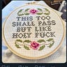 a piece of embroidery thats says “This Too Shall Pass But Like Holy Fuck”