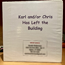 A photo of the cover of a three-ring binder titled “Karl and/or Chris Has Left the Building.”