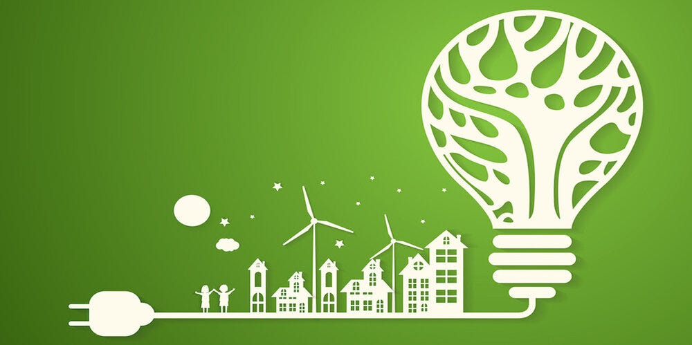 Picture of a lightbulb powered by an energy efficient city with a green background. 